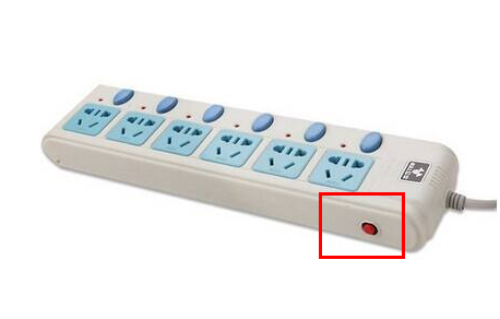 公牛插座上面有个红色小按钮是做什么用的?