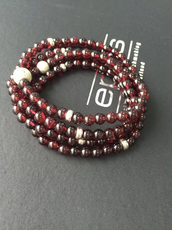 鸿星珠宝刮奖减1000，买了一条石榴石1298.不知道是真是假。